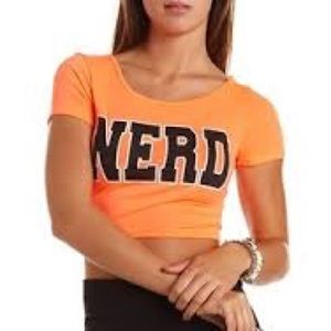 Bright orange “NERD” crop tee